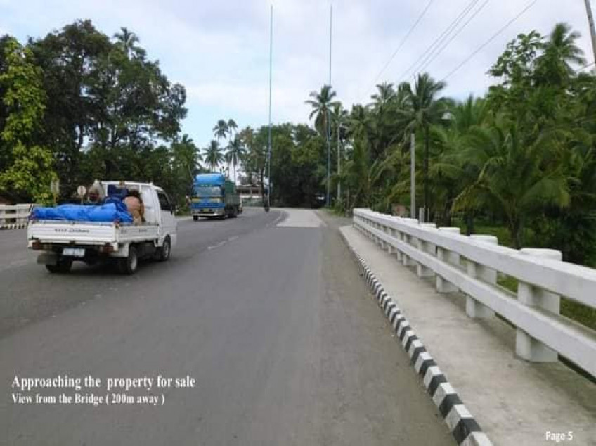 Commercial Corner Highway lot near Gaisano Cabadbaran City