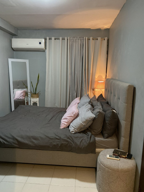 Semi-Furnished 2BR Condo With Large Living Room Plus Extra Storage In Pasig