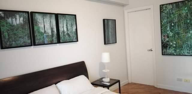 Fully-Furnished 1BR Condo with Parking at The Manansala Rockwell Makati