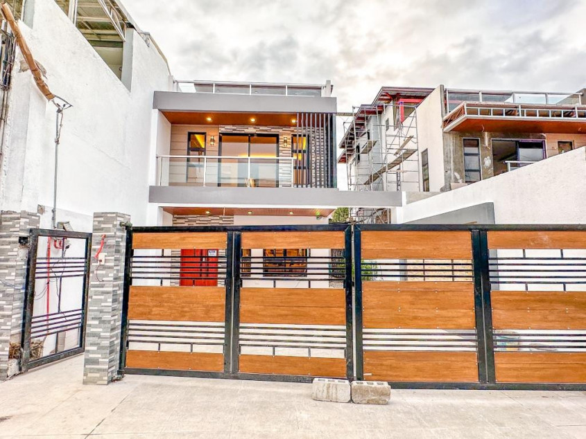 Striking 3 Storey Single Attached House in BF Resort Village Las Pinas City