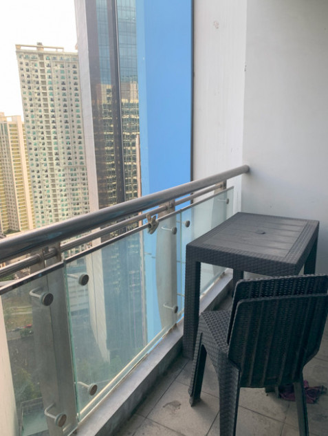 Furnished 2-Bedroom Condo With Parking For Sale