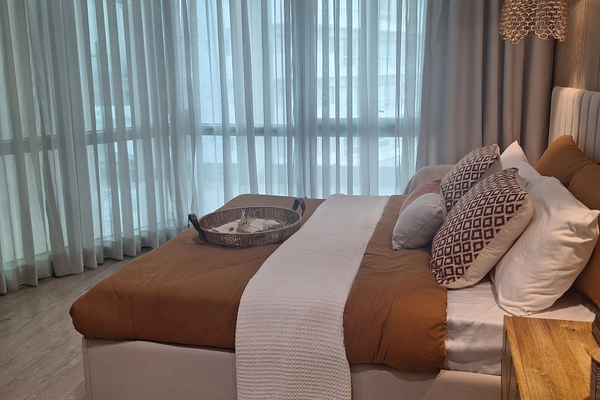 Elegant Two-Bedroom Condo with Balcony for Sale at Empress Capitol Commons (47B), Pasig City