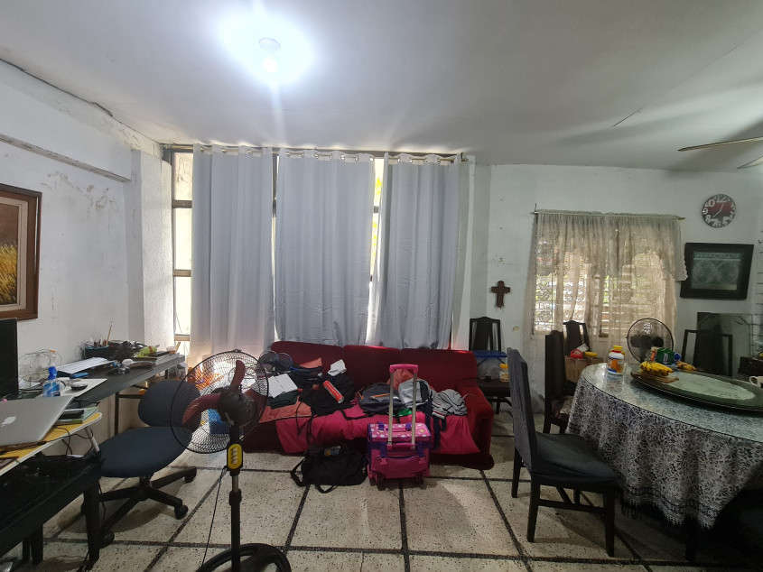 Vacant lot with old house for sale near gate 1 of Merville Park, Paranaque City