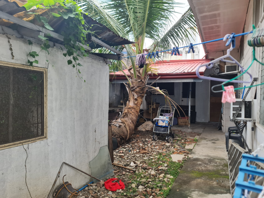 Vacant lot with old house for sale near gate 1 of Merville Park, Paranaque City