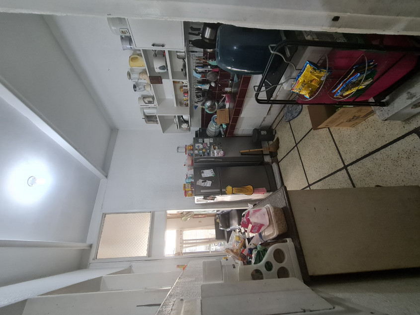 Vacant lot with old house for sale near gate 1 of Merville Park, Paranaque City