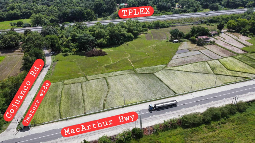 LOT NEAR MACARTHUR HIGHWAY AND TPLEX. 1,000SQM