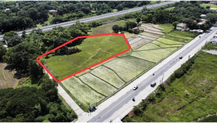 LOT NEAR MACARTHUR HIGHWAY AND TPLEX. 1,000SQM