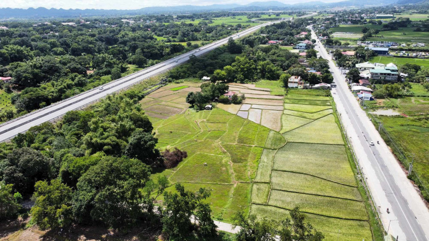 LOT NEAR MACARTHUR HIGHWAY AND TPLEX. 1,000SQM