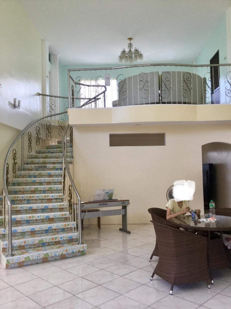 Two-story reinforced concrete building. There is an open ceiling space.