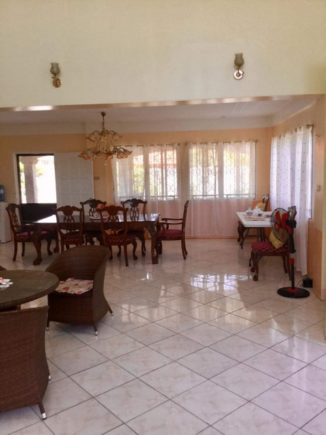Two-story reinforced concrete building. There is an open ceiling space.