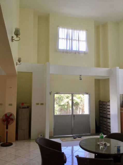 Two-story reinforced concrete building. There is an open ceiling space.