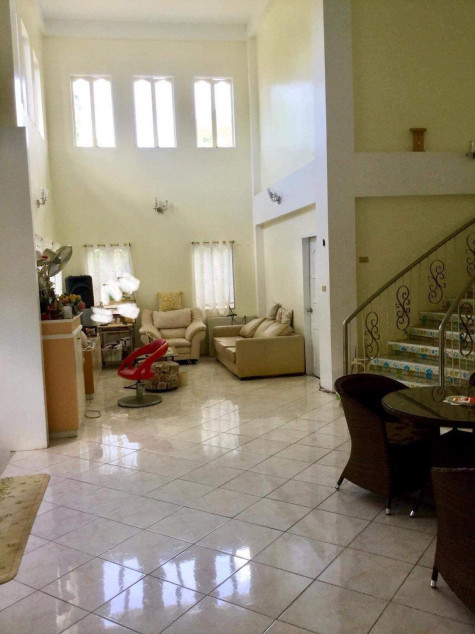 Two-story reinforced concrete building. There is an open ceiling space.