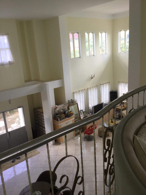 Two-story reinforced concrete building. There is an open ceiling space.