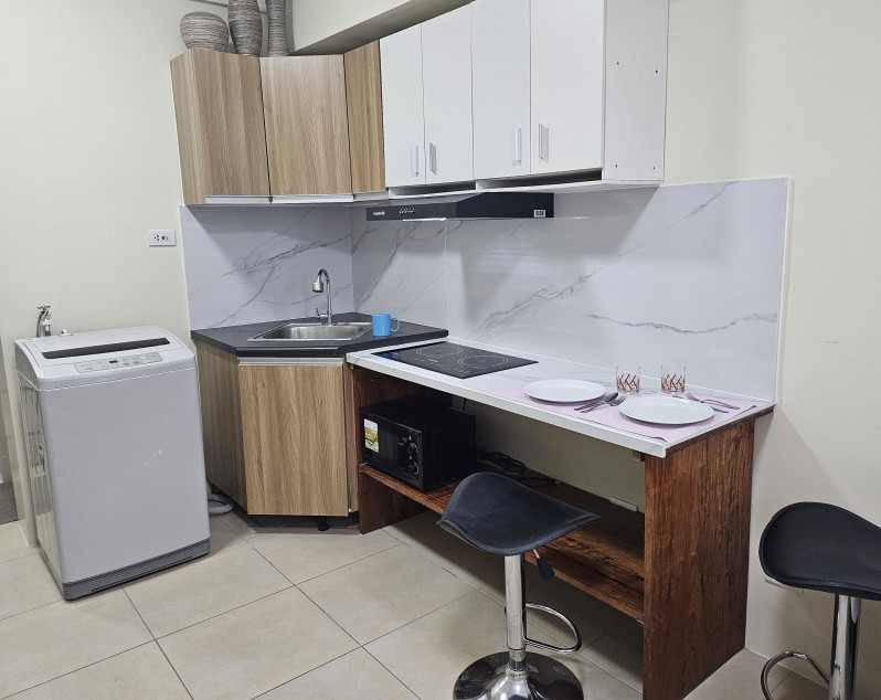 Bright Studio Unit with Pool View