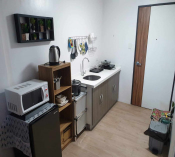 FURNISHED 1BR CONDO WITH PARKING SPACE IN STUDIO A COND. NEAR ATENEO DE MANILA IN QUEZON CITY